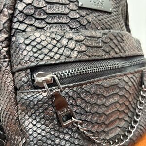 BCBG Paris Shimmering Snake-Patterned Mini-Backpack